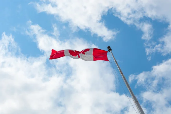 Ontario flag against cloudy sky — Stock Photo, Image