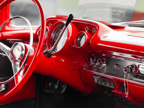 Red steering wheel of a classic car — Stock Photo, Image