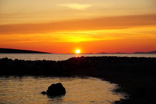Peaceful Colorful Orange Sea Sunset Pebbles Sandbar — Stockfoto