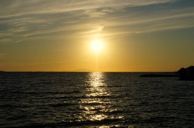 Golden hour during sunset on the beautiful seascape at summer evening