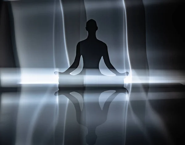 Lotus pozisyonunda oturan bir adam.