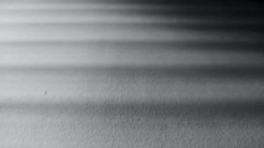 Arkaplan için ışık ve gölgenin dokulu geometrik oyunu