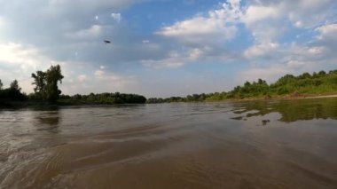 Summer landscape of a mountain river at sunset hour