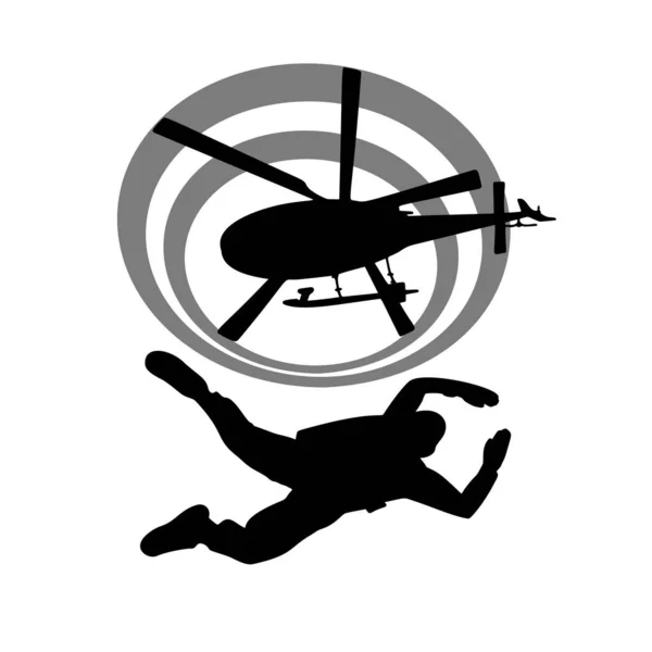Hava dalışı silueti Helikopter ve paraşütle atlama anı