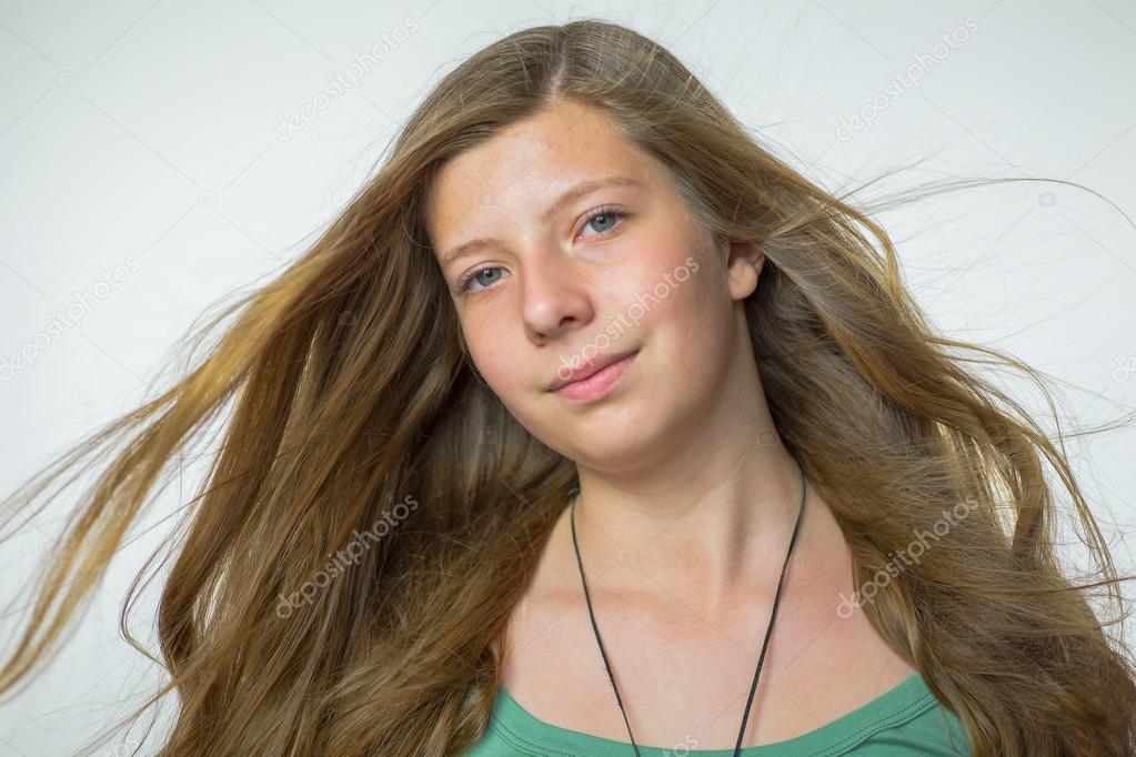 Blonde girl with blown hair