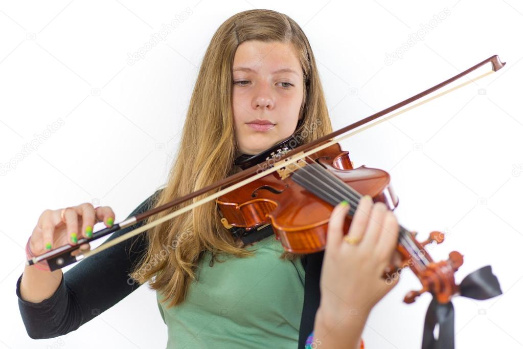 European teenage girl playing violin