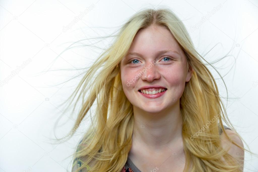 Light blonde girl with hair in wind