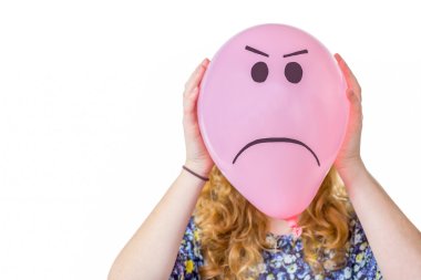 Pink balloon with expression in front  of girls face clipart
