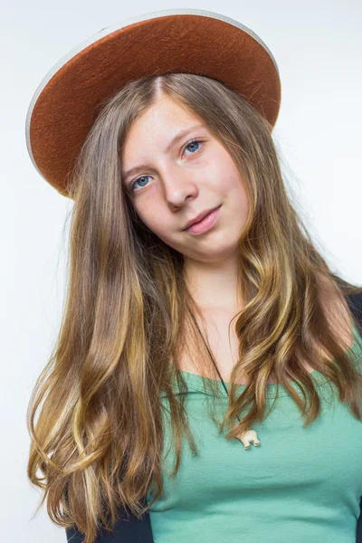 Blonde teenage girl wearing brown hat — Stock Photo, Image