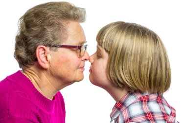 Dutch grandmother and grandchild noses touching clipart