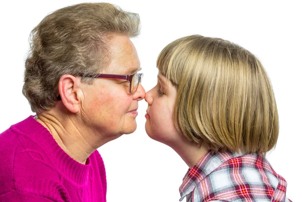 Nederländska mormor och barnbarn näsor röra — Stockfoto