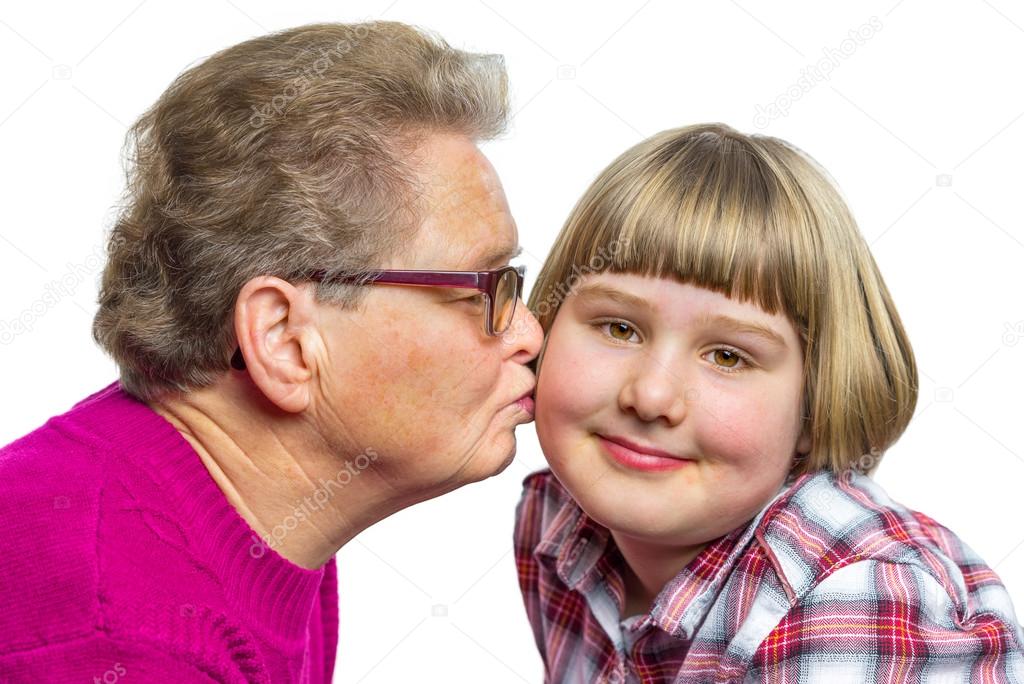 Dutch grandmother kisses grandchild on cheek