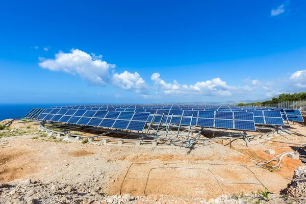 Field of solar collectors on rotatable construction
