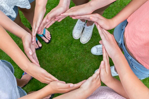 Many arms of children with hands making circle — Stock Photo, Image