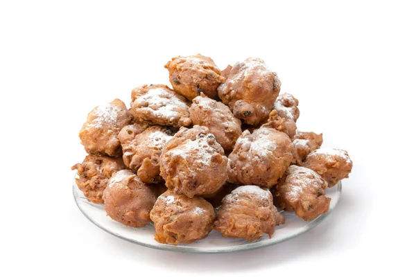 Montón de buñuelos fritos azucarados o oliebollen a escala —  Fotos de Stock