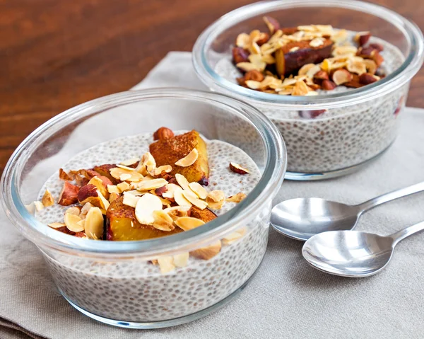 Vanilla chia seed pudding with baked prunes and nuts — Stock Photo, Image