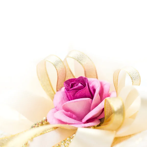 Rose and ribbon — Stock Photo, Image