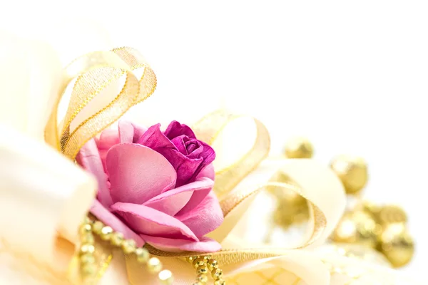 Rose and ribbon — Stock Photo, Image