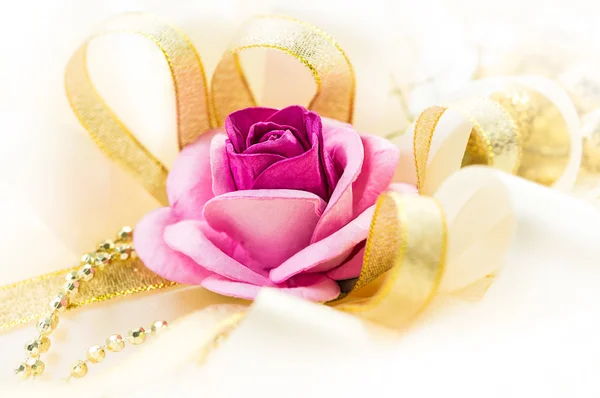 Rose and ribbon — Stock Photo, Image