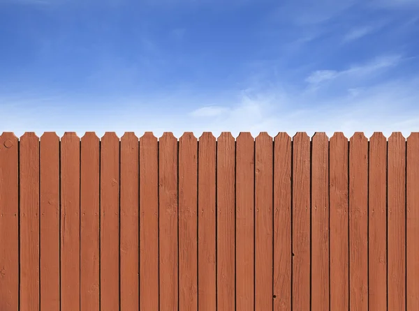 Fence wooden parallel bars, painted brown.