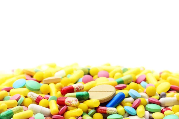 Πολλά διαφορετικά φάρμακα χάπια σε λευκό φόντο — Φωτογραφία Αρχείου