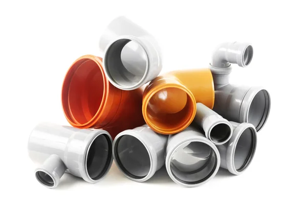 Composition from plastic sewer pipes, isolated on the white — Stock Photo, Image