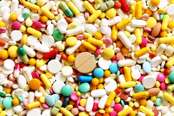 Много красочных лекарств и таблеток сверху Стоковое Фото