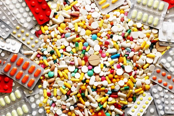 Много красочных лекарств и таблеток сверху Лицензионные Стоковые Изображения