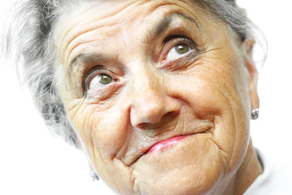 Mujer vieja sonrisa cara en blanco — Foto de Stock