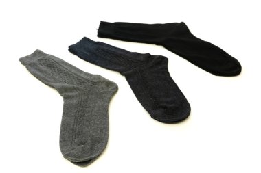 Üç çorap beyaz bir arka plan üzerinde izole