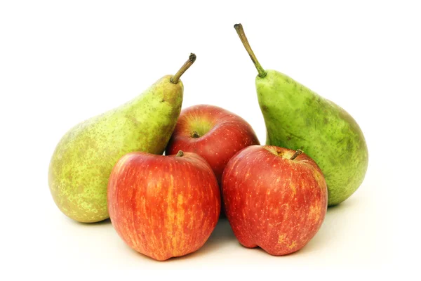 A lot of pears and apples on white — Stock Photo, Image
