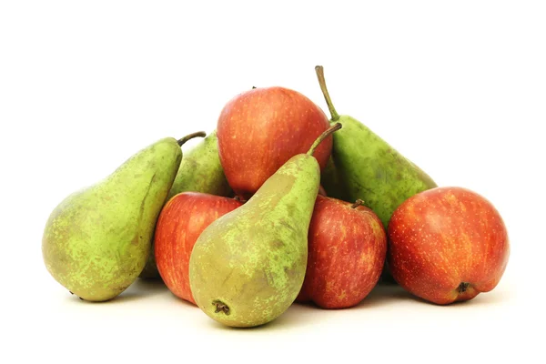 A lot of pears and apples on white — Stock Photo, Image