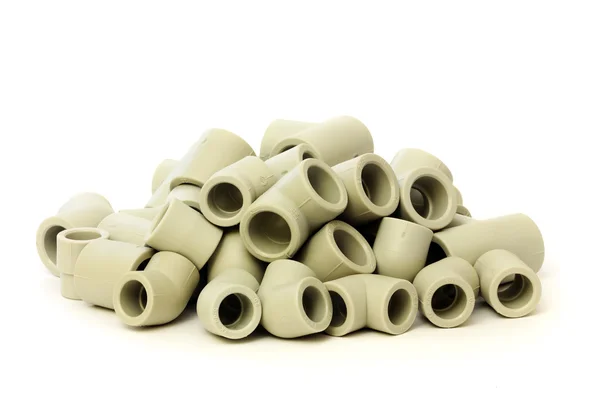 A lot of combined fittings for plastic pipes — Stock Photo, Image