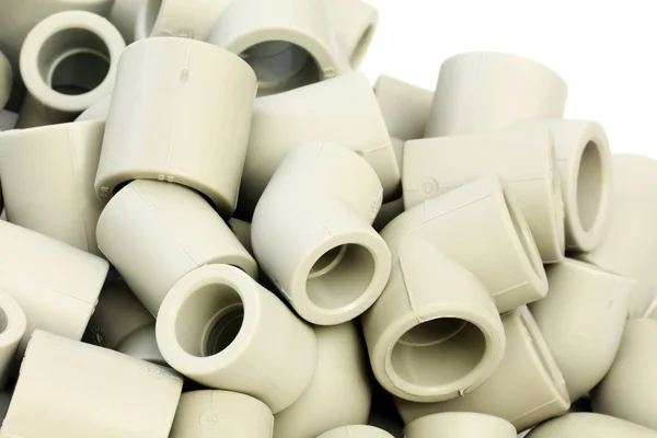 A lot of combined fittings for plastic pipes — Stock Photo, Image