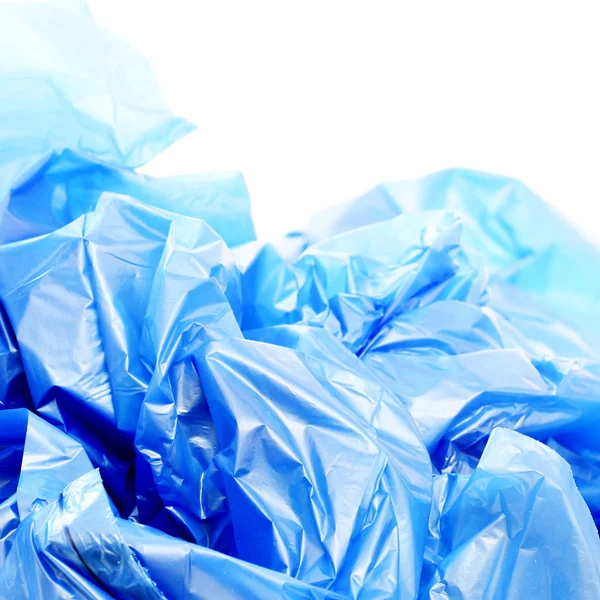 Sacs poubelle en plastique bleu sur fond blanc — Photo