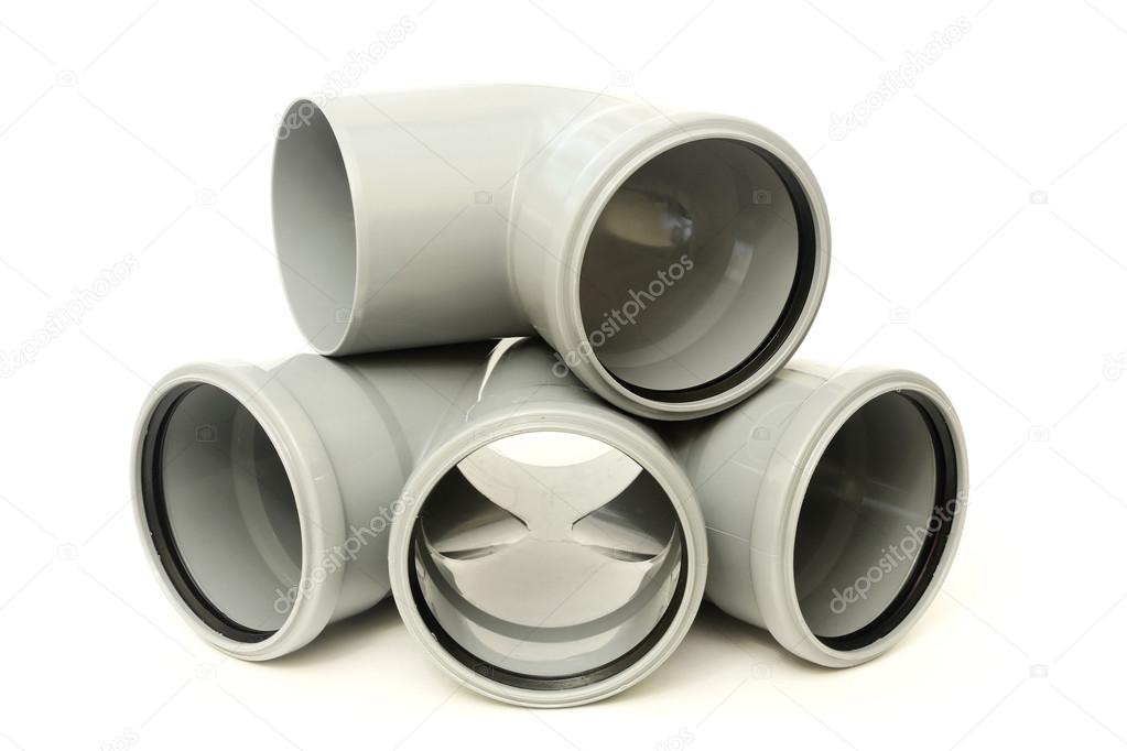 Composition from plastic sewer pipes, isolated on the white