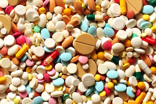 Много красочных лекарств и таблеток сверху Лицензионные Стоковые Фото