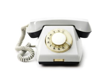 Beyaz arka plan üzerinde eski beyaz telefon