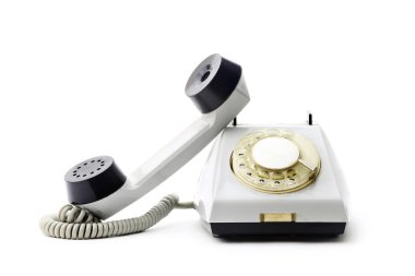 Beyaz arka plan üzerinde eski beyaz telefon