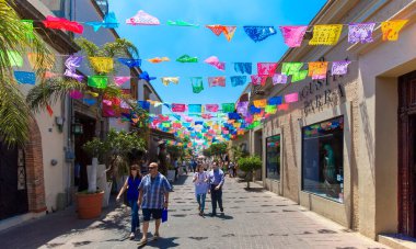 Guadalajara, Tlaquepaque scenic colorful streets during a peak tourist season clipart
