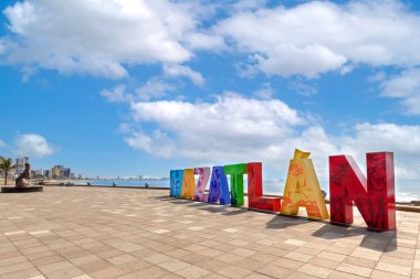 Big Mazatlan Letters at the entrance to Golden Zone Zona Dorada , a famous touristic beach and resort zone in Mexico clipart