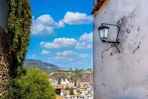 Mexico, Scenic Taxco colonial architecture and cobblestone narrow streets in historic city center near Santa Prisca church