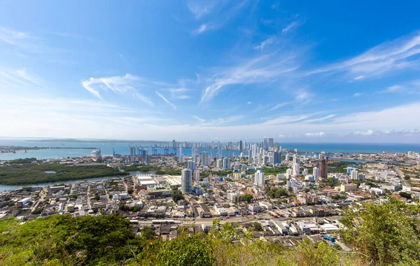 Flag wavering in front of scenic view of Cartagena modern skyline near historic city center and resort hotel zone — 스톡 사진