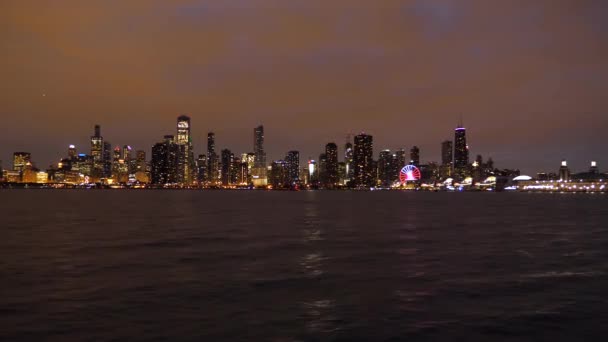 Chicago Cityscape at Night, Downtown Skyscrapers and Navy Pier Ferris Wheel — Stock Video