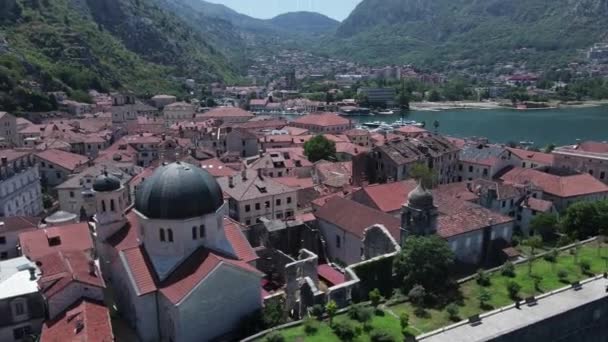 Old Town Kotor, Montenegro. Drone Aerial View of Cityscape and Fort in Bay — Stock Video