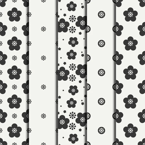 Set of monochrome abstract seamless floral pattern. Flowers and leaves. Wrapping paper. Scrapbook. Tiling. Vector illustration. Spring floral background. Graphic texture. Wallpaper. Floral texture — Stock Vector