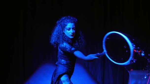 Female performer in soap bubbles magician show — Stock Video