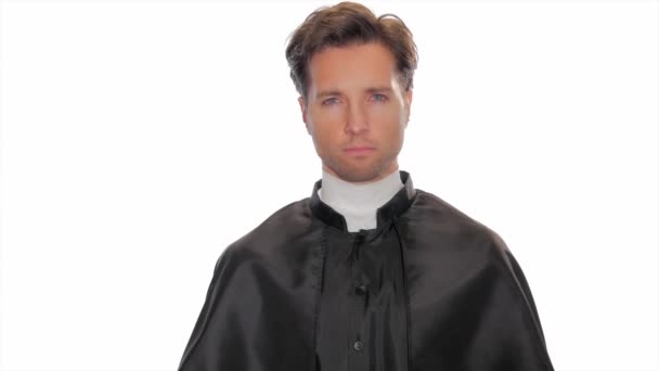 Proud young priest holding a crucifix — Stock Video