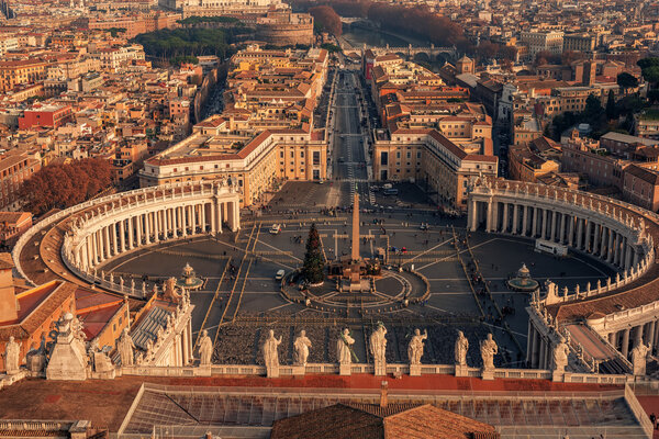 Aerial view of Vatican City and Rome, Italy: St. Peters Square in the sunrise
