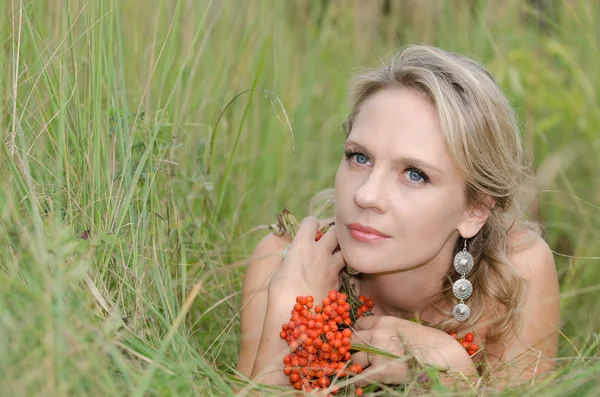 Young woman with rowan — Stock Photo, Image